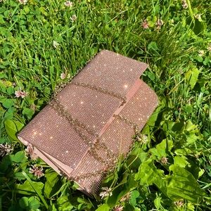 Rose gold clutch bag